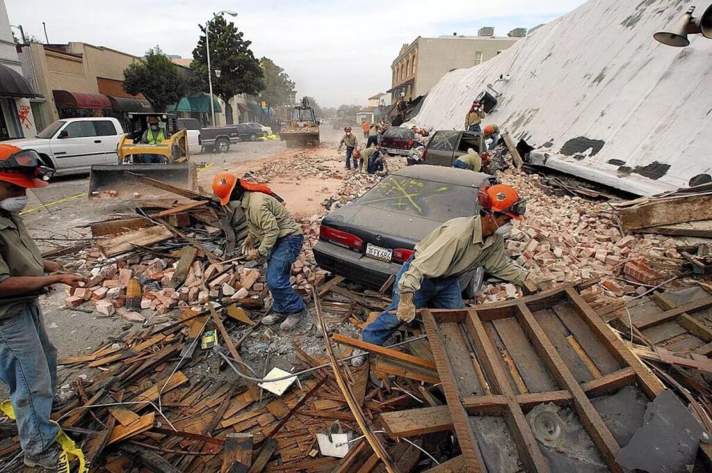 Rescue workers sift through debris from the earthquake.